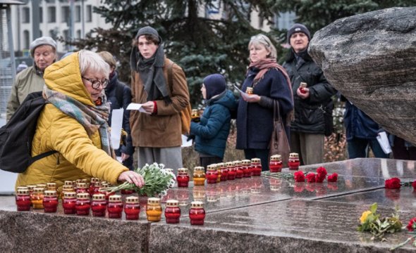В центре Москвы вспомнили жертв политических репрессий. Фоторепортаж