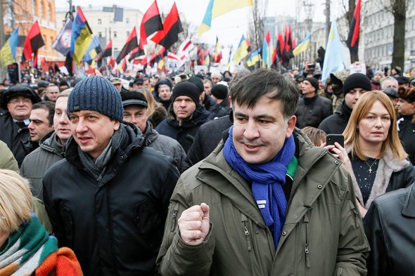 Сторонники Саакашвили штурмовали здание в центре Киева. Фоторепортаж